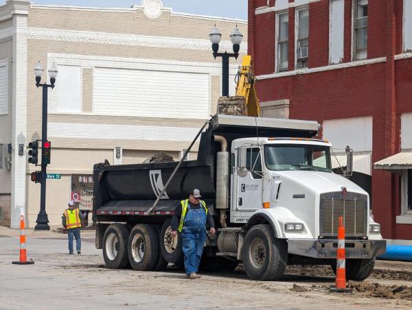 Utility contractors work just south of Main Street intersection ahead of Wednesday's closure.