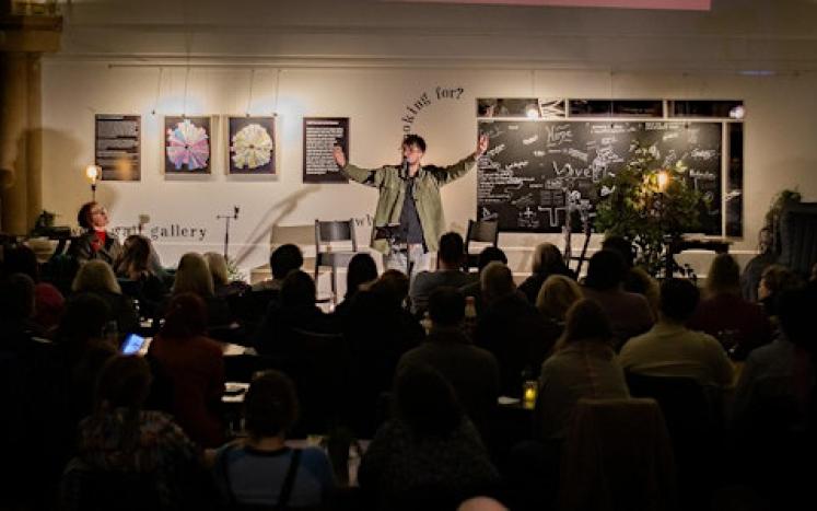 photo courtesy of urban wordsmiths program, poetry reading, public poetry performance